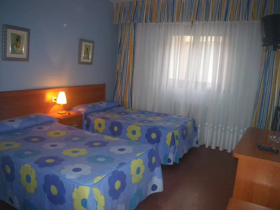 Dormitorio cuádruple