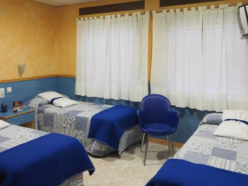 Habitación Triple Camas Individuales