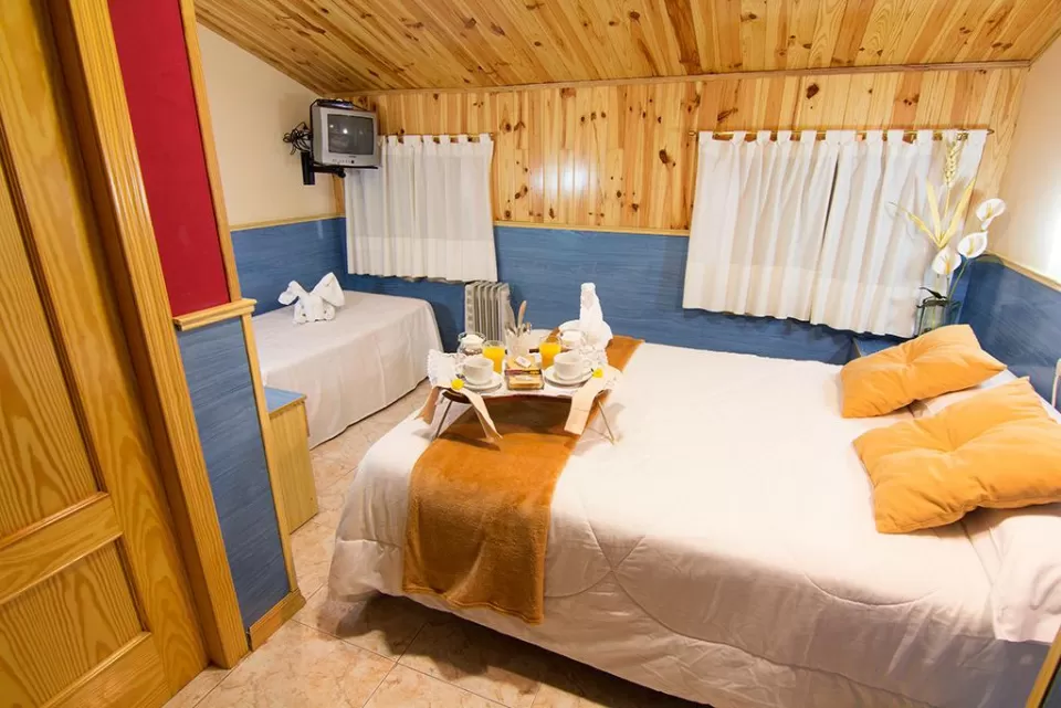Habitación Triple dos camas (Cama de Matrimonio + Cama Individual)