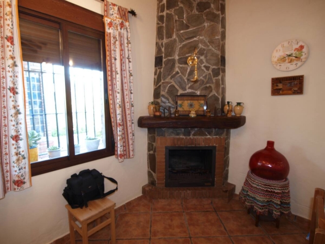Sala de estar y su chimenea
