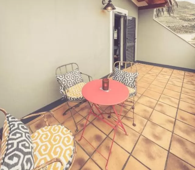 6 Habitación triple con terraza
