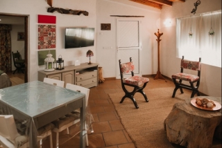 Sala amplia con la cocina