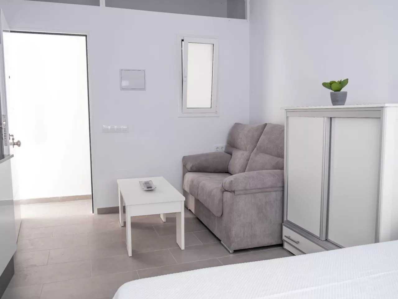 Estudio moderno céntrico para familias y parejas