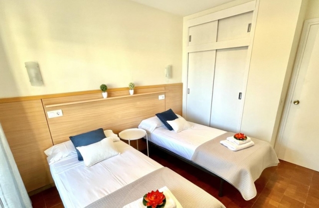 dormitorio doble con 2 camas