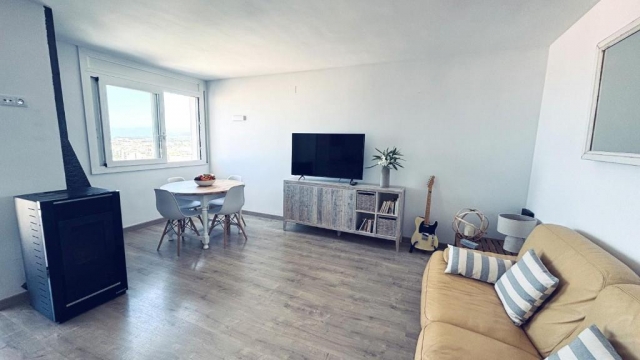 Sala amplia con estufa