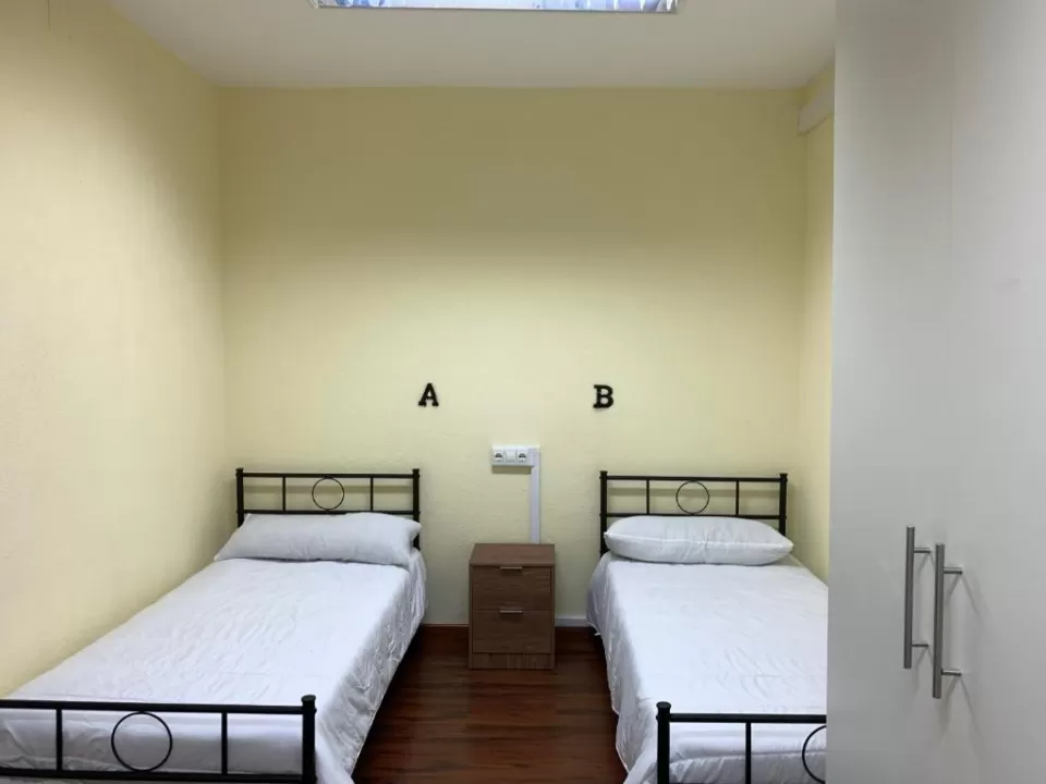 Doble con baño compartido