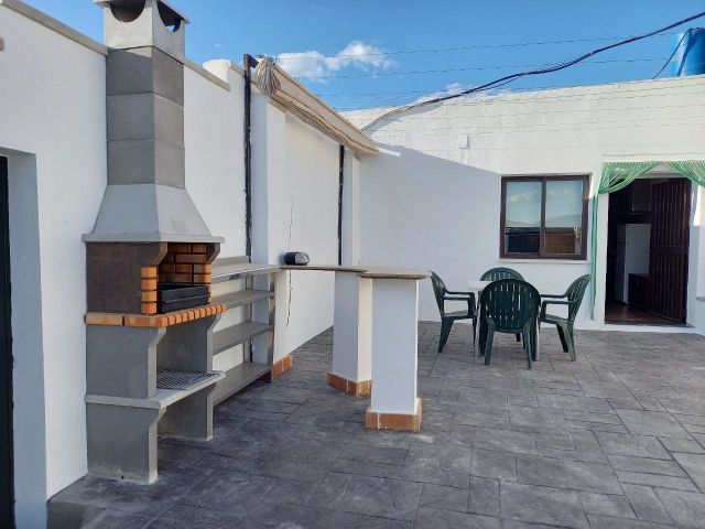 El patio con barbacoa