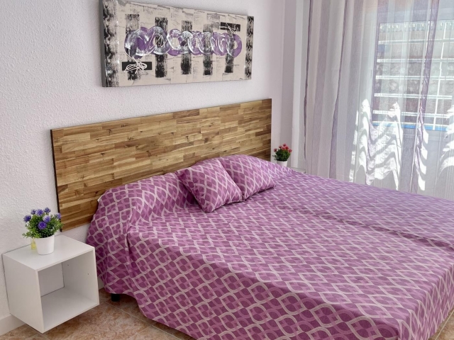 Un dormitorio con 2 camas