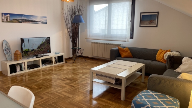 Salon con tele de plasma