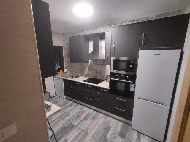 Cocina con electrodomesticos