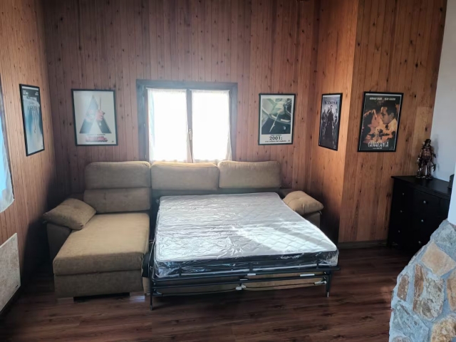Sala con sofa cama