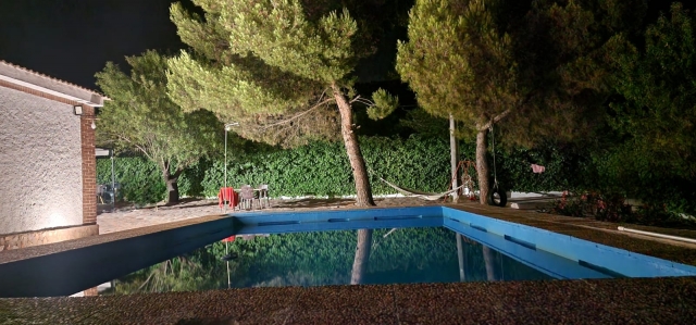 Patio exterior con piscina