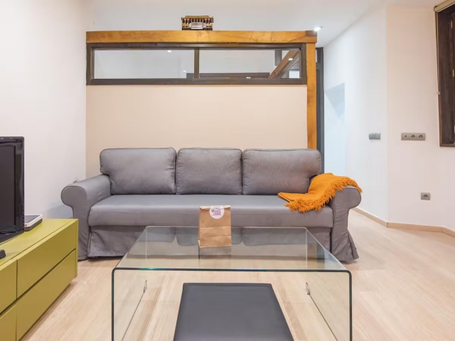 Sala de estar con sofa