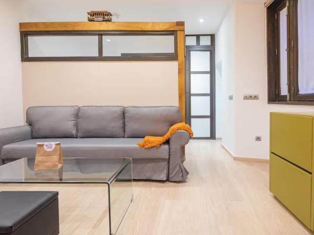 Sala de estar con sofa 