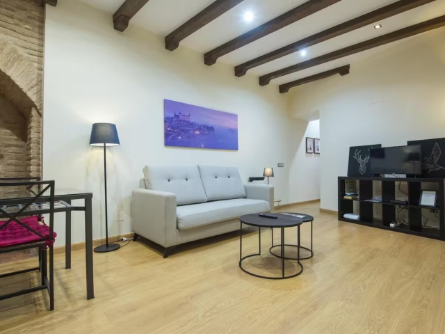 Sala amplia con sofá cama