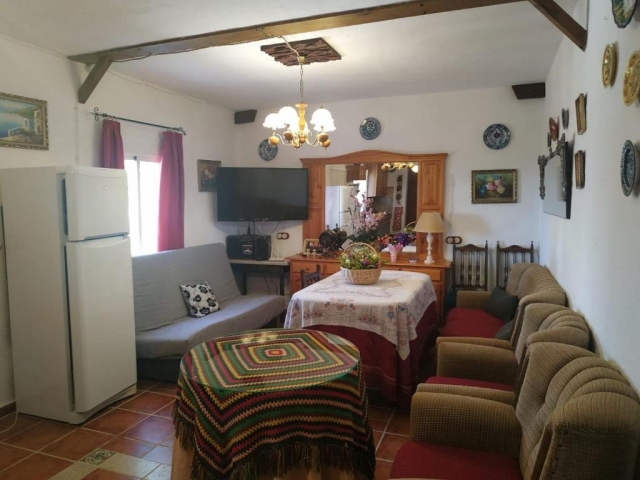 Sala amplia con tele