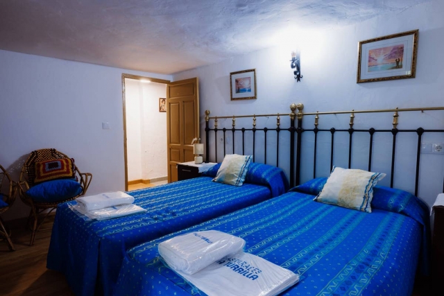 Dormitorio triple con camas