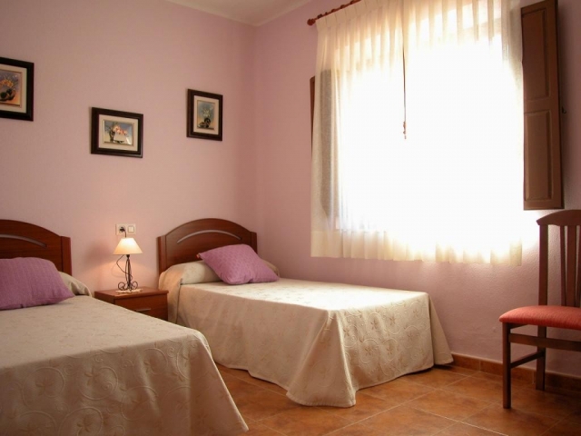 Dormitorio doble morado