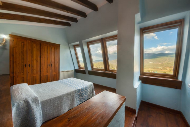 DIOSA dormitorio con vistas