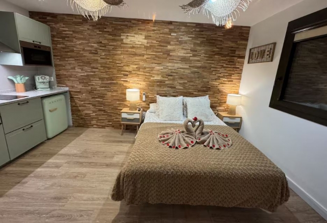 Dormitorio y cocina al lado