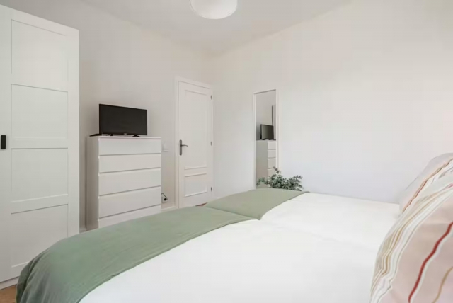 Dormitorio doble con tele 