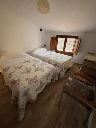 Dormitorio doble con camas