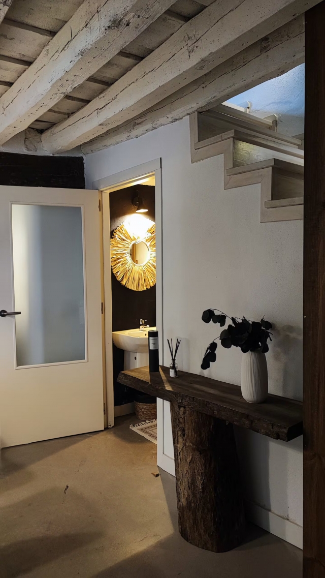 Sala de estar y aseo