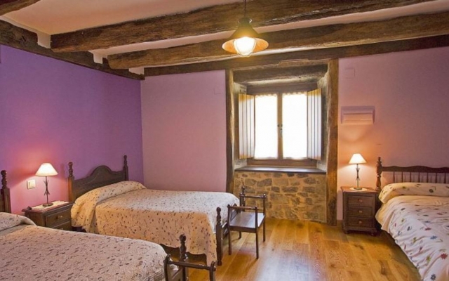 Dormitorio varias camas