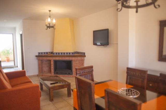 1 Sala con chimenea y tele