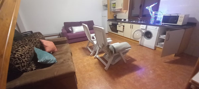 Sala amplia y sillones