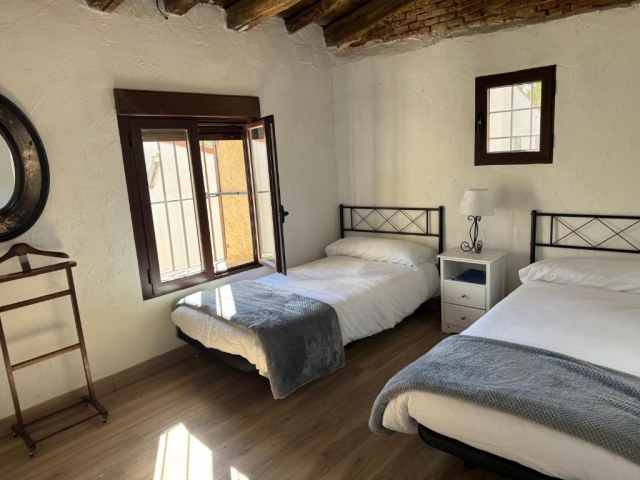 Dormitorio doble con camas