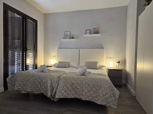 Dormitorio doble con camas