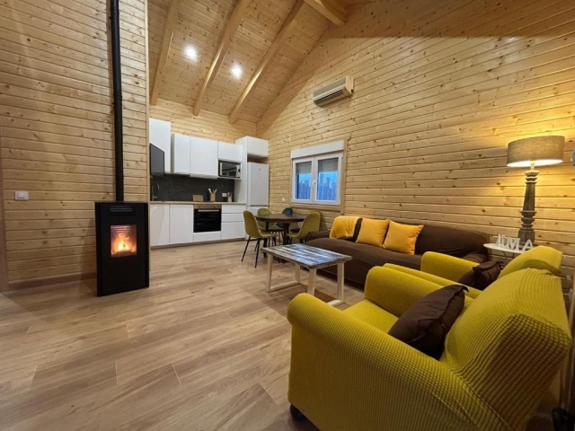 Sala amplia con estufa