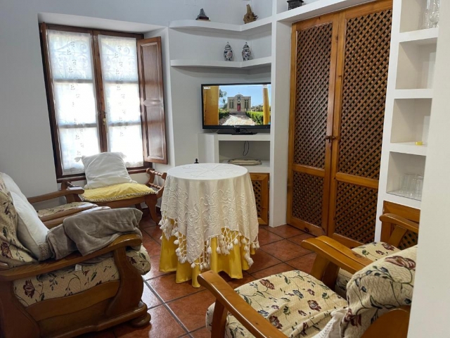 Sala de estar con tele 