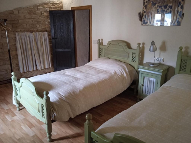 Dormitorio y dos camas 