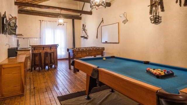 Sala de ocio con billar 