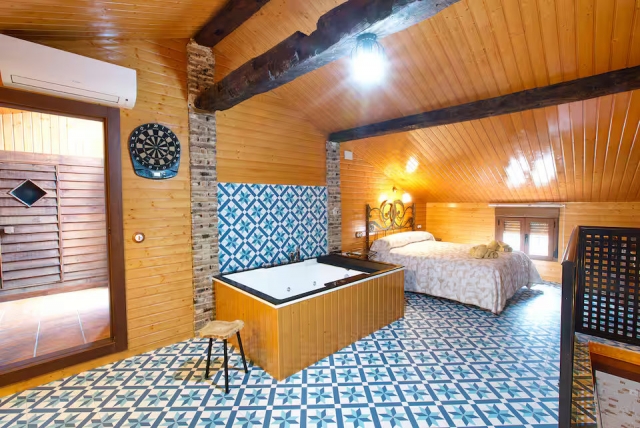 Buhardilla con jacuzzi