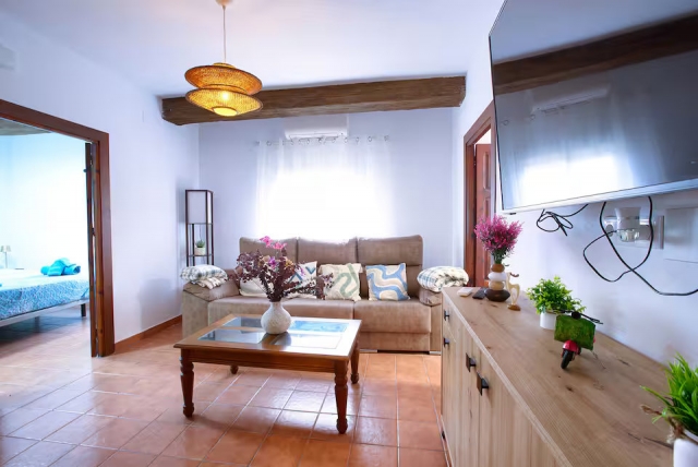 Sala amplia con tele