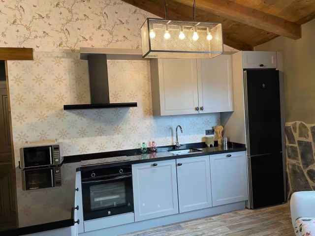 Cocina con encimera en L