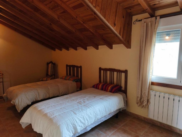 Dormitorio con camas