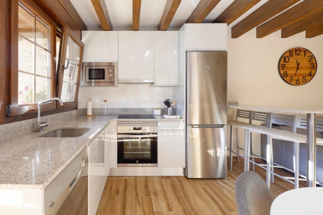 Cocina con encimera en L