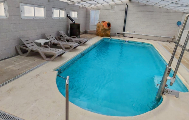 Acceso piscina climatizada