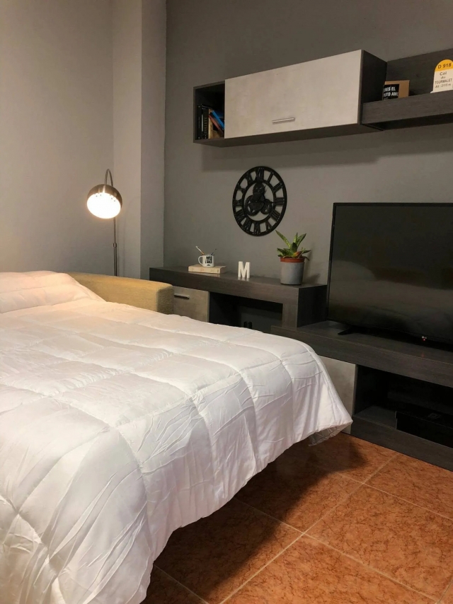 Sala con sofa cama