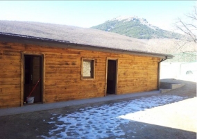 Cabaña en madera con entorno