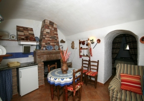 Salón con apertura al comedor en ladrillo