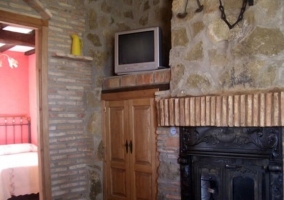 Salón comedor con puerta de entrada partida