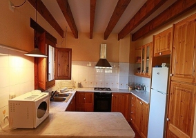 Cocina completamente equipada con horno