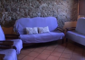Sala de estar con sillones en azul