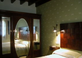 Camas individuales en dormitorio en planta baja