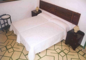 Dormitorio doble con camas individuales